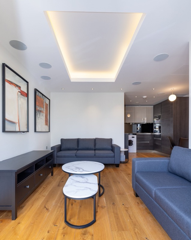 Contemporary living space with built-in speakers