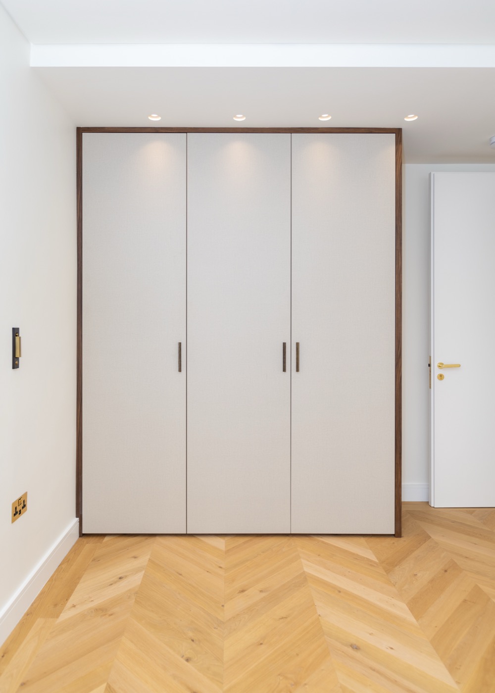 Bedroom with closed built-in wardrobe