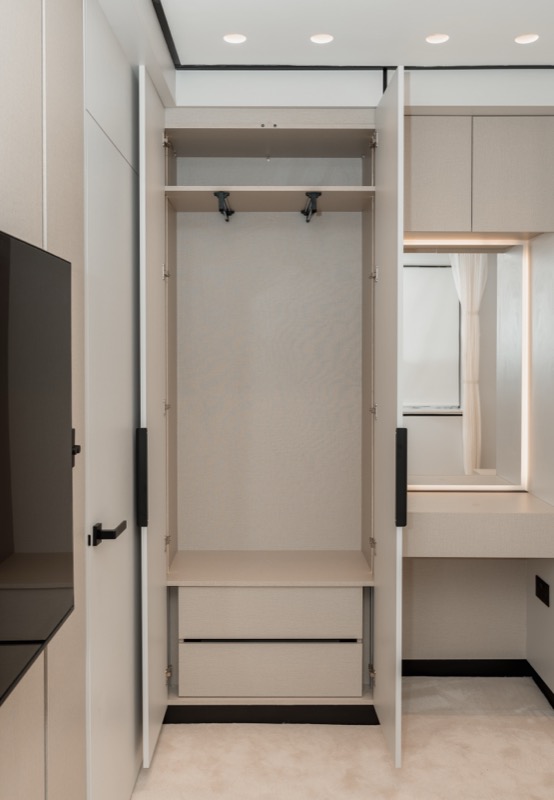 Modern wardrobe interior with integrated dressing area
