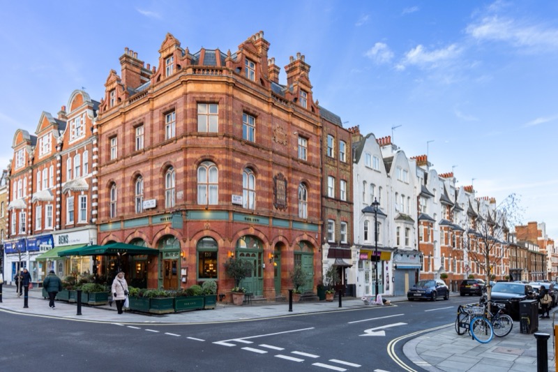 Victorian corner building with café on St John's Wood High Street NW8
